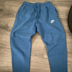 Blue Nike sweat pants in a size small